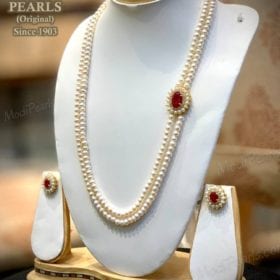Elegant Pearl-Ruby Broach Set Image