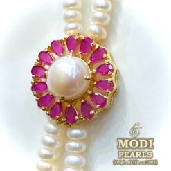simple pearl broach set with ruby