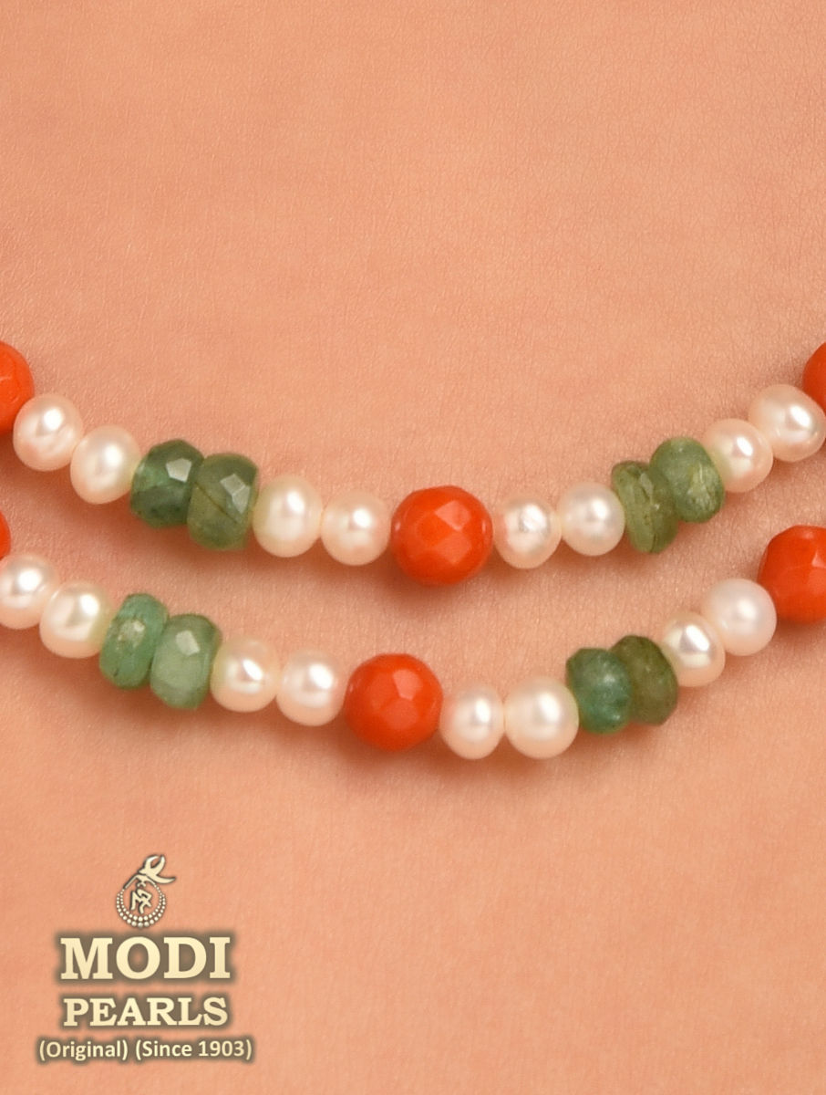 Roseberys London | A cultured pearl necklace with diamond and jadeite jade
