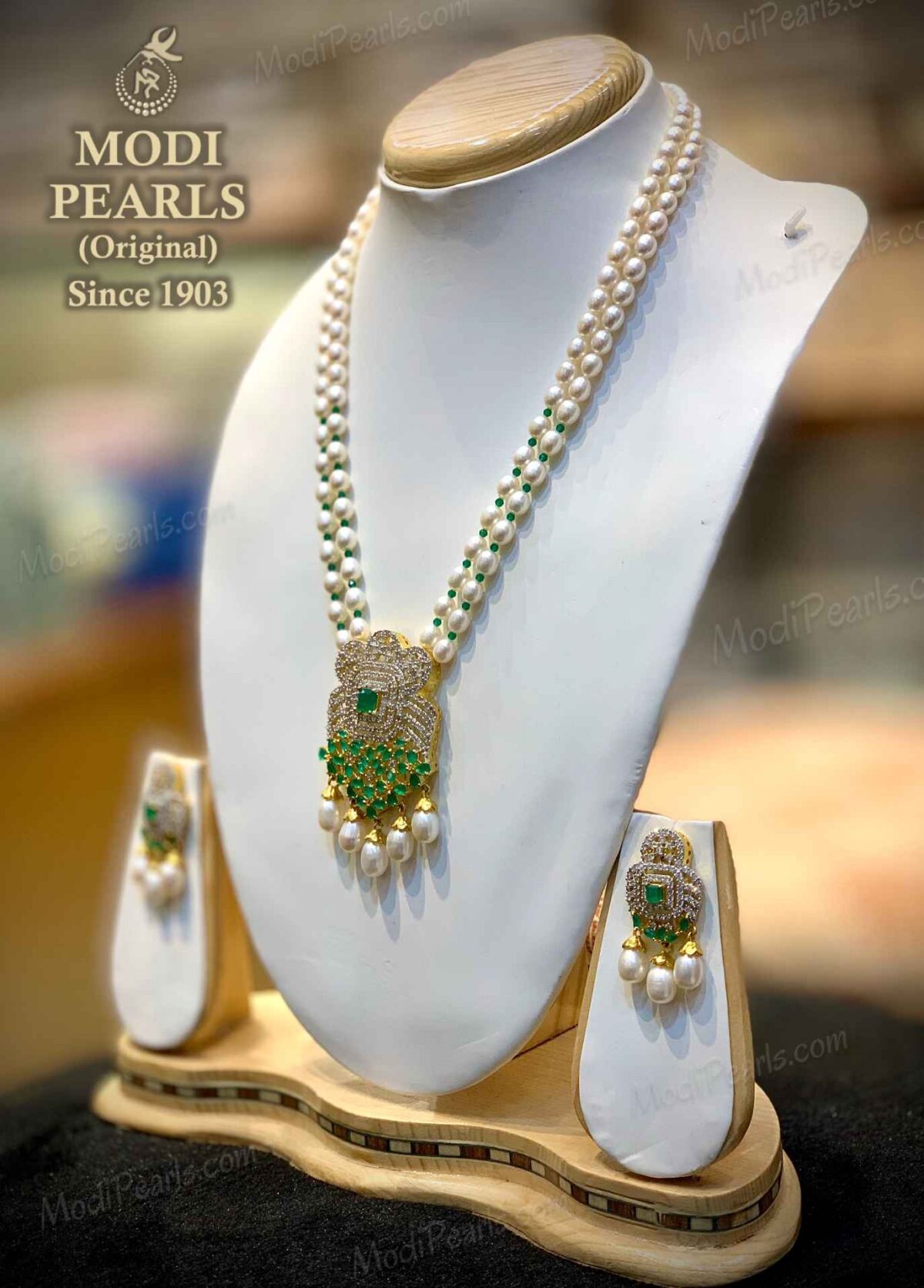 buy two row pearl pendant set with emerald